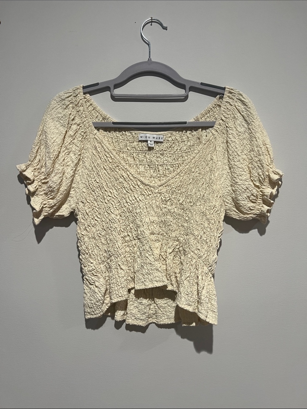 Miou Muse Cream Crinkle V-Neck Peplum Top